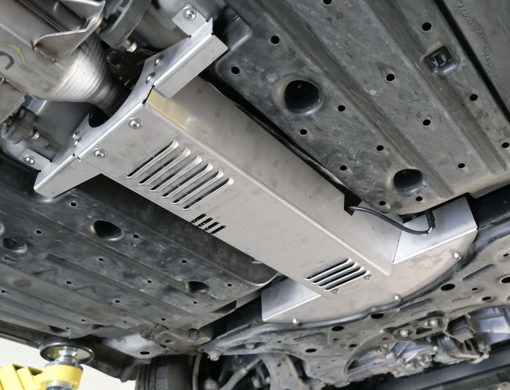 Miller Cat Prius catalytic converter shield installed on car